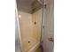 Bathroom showcasing a stand-up shower stall with white wall surround and silver fixtures at 186 Grapevine Dr, Douglasville, GA 30134