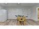 Finished basement features a classic foosball table perfect for entertaining friends and Gathering at 3760 Ansley Park Dr, Suwanee, GA 30024