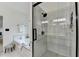 Beautiful bathroom featuring marble tiled shower and separate tub at 3760 Ansley Park Dr, Suwanee, GA 30024