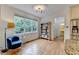 Cozy breakfast nook with a large window and a view of the backyard at 3760 Ansley Park Dr, Suwanee, GA 30024