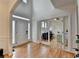 Bright foyer with hardwood floors, and an elegant front door that leads into the home's living spaces at 3760 Ansley Park Dr, Suwanee, GA 30024