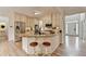 Well-appointed kitchen with granite countertops, stainless steel appliances, and a breakfast bar at 3760 Ansley Park Dr, Suwanee, GA 30024