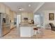 Spacious kitchen featuring a large island, stainless steel appliances, and ample cabinet space at 3760 Ansley Park Dr, Suwanee, GA 30024