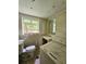 Bathroom area with old toilet, sink, mirror and washer in need of repairs at 6616 King George Way, Morrow, GA 30260