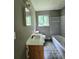 Bathroom featuring tiled floor and shower/tub at 6616 King George Way, Morrow, GA 30260