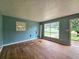 View of the Living room with a door leading to exterior deck at 6616 King George Way, Morrow, GA 30260