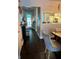 Dining area showcasing a view into the kitchen, complemented by hardwood floors at 6620 Wellington Sq, Norcross, GA 30093