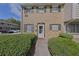 Charming brick townhouse featuring neat shrubbery and a welcoming front door at 4701 Flat Shoals Rd # 50A, Union City, GA 30291