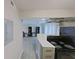 Modern kitchen with sleek countertops, contemporary appliances, and an open layout to living room at 4701 Flat Shoals Rd # 50A, Union City, GA 30291