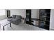 Well-lit living room with modern flooring, neutral walls, and ample storage space at 4701 Flat Shoals Rd # 50A, Union City, GA 30291