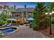 Stunning backyard with a pool, patio area, and lush landscaping, perfect for entertaining at 1220 Waterfall Nw Ln, Acworth, GA 30101