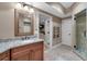 Bathroom with sink, granite countertops, tiled floors, and a stylish design at 1220 Waterfall Nw Ln, Acworth, GA 30101