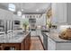 Beautiful kitchen showcasing granite countertops, modern fixtures and stainless steel appliances at 1220 Waterfall Nw Ln, Acworth, GA 30101