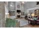 Spacious living room with vaulted ceilings, fireplace, built in bookcases, and comfortable seating at 1220 Waterfall Nw Ln, Acworth, GA 30101