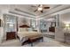 View from Main Bedroom showcasing sitting room area, tray ceilings, neutral colors, and many windows at 1220 Waterfall Nw Ln, Acworth, GA 30101