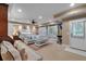 Expansive main bedroom featuring a sitting area, ceiling fan, and natural light from the windows at 1220 Waterfall Nw Ln, Acworth, GA 30101