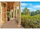 Spacious covered porch with elegant columns, offering a beautiful outdoor space at 1220 Waterfall Nw Ln, Acworth, GA 30101