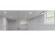Spacious finished basement with bright recessed lighting, window and bonus room with storage at 1706 Brandon Lee Sw Way, Marietta, GA 30008
