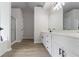 Modern bathroom with double vanity, walk-in shower, and luxurious tub at 1706 Brandon Lee Sw Way, Marietta, GA 30008