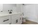 Updated bathroom featuring new cabinets, faucet, and shower at 1706 Brandon Lee Sw Way, Marietta, GA 30008