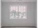 Bedroom featuring window, neutral carpet, and neutral paint at 1706 Brandon Lee Sw Way, Marietta, GA 30008