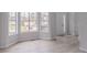Inviting living room featuring large windows that flood the space with natural light at 1706 Brandon Lee Sw Way, Marietta, GA 30008