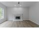 Bright living room featuring a fireplace and large window at 1706 Brandon Lee Sw Way, Marietta, GA 30008