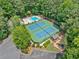 Aerial view of community amenities featuring pool, tennis courts, playground, and parking at 2010 Pearwood Path, Roswell, GA 30076