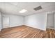 Spacious finished basement area with durable floors and modern lighting at 2010 Pearwood Path, Roswell, GA 30076