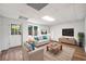 Finished basement living area with comfortable seating and natural light at 2010 Pearwood Path, Roswell, GA 30076