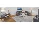 Comfortable living room area with modern decor, soft gray carpet, and lots of light at 2010 Pearwood Path, Roswell, GA 30076