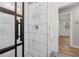 Bathroom featuring a shower with stylish tile and glass door at 2060 Panstone Sw Ct, Marietta, GA 30060