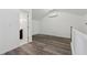 Bright bedroom boasts hardwood floors and a new AC unit at 2060 Panstone Sw Ct, Marietta, GA 30060