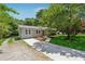 Charming one-story home with a well-manicured lawn and newly paved driveway at 2060 Panstone Sw Ct, Marietta, GA 30060