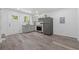 Modern kitchen with gray cabinets, stainless steel appliances, and granite countertops at 2060 Panstone Sw Ct, Marietta, GA 30060
