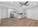 Spacious, open-concept floor plan with hardwood flooring and stainless steel appliances at 2060 Panstone Sw Ct, Marietta, GA 30060