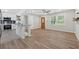 Well-lit living area with a modern ceiling fan and hardwood flooring at 2060 Panstone Sw Ct, Marietta, GA 30060