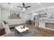 Bright living room with a modern sofa, stylish decor, and open floor plan at 2060 Panstone Sw Ct, Marietta, GA 30060