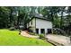The house features a back deck, a patio, a garden, and a two-car garage at 2985 Heather Stone Way, Lawrenceville, GA 30043