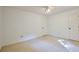 Bedroom has neutral carpet, white walls and a ceiling fan at 2985 Heather Stone Way, Lawrenceville, GA 30043