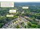 An aerial view of the neighborhood near Berkeley Lake at 3585 Berkeley Park Ct, Duluth, GA 30096