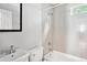 Clean bathroom with a combined tub and shower and a classic sink at 1891 8Th St, Atlanta, GA 30341