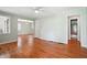 Cozy living room featuring hardwood floors, a ceiling fan, and great natural light at 1891 8Th St, Atlanta, GA 30341