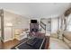 Comfortable living room featuring hardwood floors, a brick fireplace, and ample natural light at 244 Timber Creek Sw Ln, Marietta, GA 30060