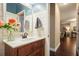 Charming bathroom features shiplap walls, a modern vanity, and a decorative vase with flowers at 3286 Crawford Cir, Marietta, GA 30066