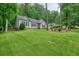 Lush green front yard featuring mature trees and landscaping at 3286 Crawford Cir, Marietta, GA 30066