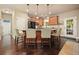 Kitchen features a central island with bar stools, ample counter space, and stainless steel appliances at 3286 Crawford Cir, Marietta, GA 30066