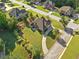 Aerial view of the home, showing the mature trees, circular driveway, and manicured lawn at 2900 Sutton Pl, Conyers, GA 30013