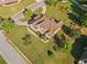 Aerial view of a home featuring a manicured lawn and mature trees in a suburban setting at 2900 Sutton Pl, Conyers, GA 30013