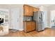 Kitchen with stainless steel refrigerator and exterior entrance to the home at 2900 Sutton Pl, Conyers, GA 30013